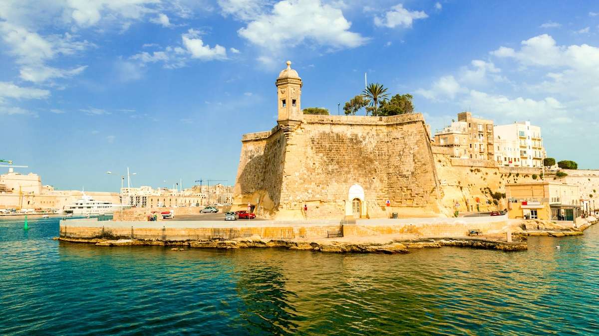 view of Valletta with watch tower and Gardjola Gardens
