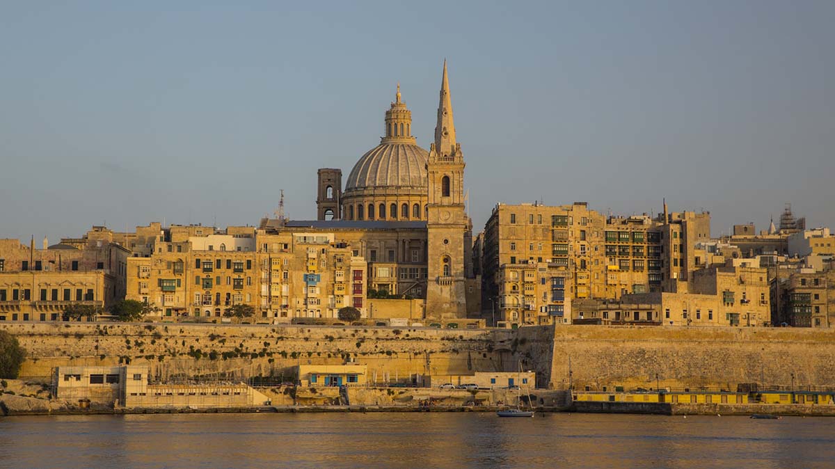 Dome of carmelite church and St. Paul's Cathedral over water, Va